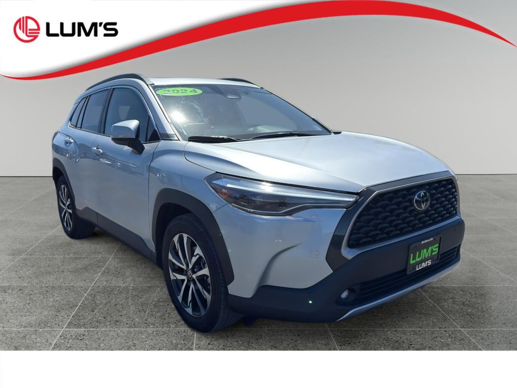 2024 Toyota Corolla Cross XLE in Silver — front three-quarter view